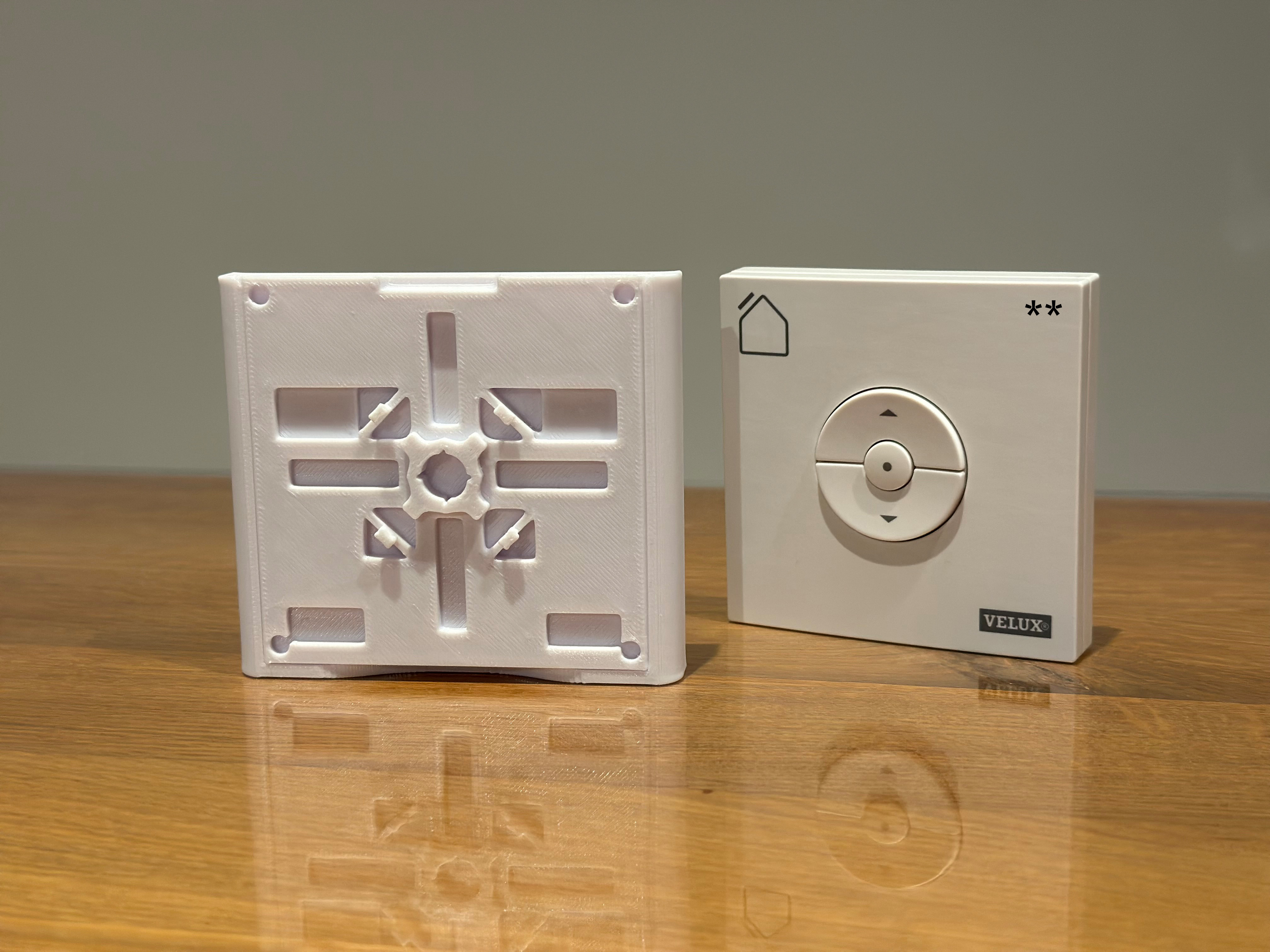 Wandhalterung für den Velux Integra Funk-Wandschalter KLI 310, 311, 312, 313 - bis zum Jahr 2021 Wandhalterung für den Velux Integra Funk-Wandschalter KLI 310, 311, 312, 313 - bis zum Jahr 2021